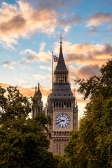Fototapeta na wymiar Historic Landmark, Big Ben, at Palace of Westminster. Cloudy Sunset Sky Art Render. London, United Kingdom. Travel Destination