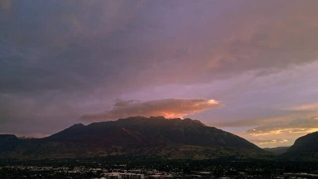 Aerial view during sunrise looking at Timpanogos Mountain over Utah Valley.