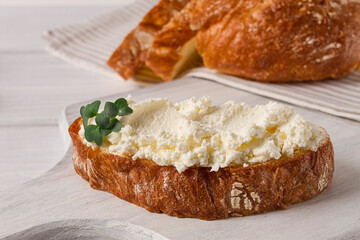 Sandwich, with cream cheese, homemade, on a cutting board, rustic style, no people, selective focus, breakfast