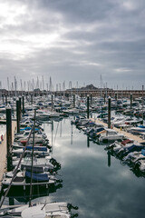Boats moored at low tide at the Elizabeth Marina