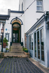 Beautiful old British pub in Jersey Island on cloudy day