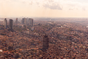 Top view of the cityscape. Skyscrapers, rooftops, streets and roads of Istanbul city.