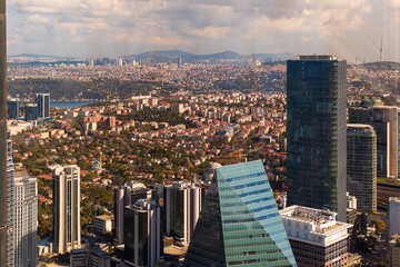 Top view of the cityscape. Skyscrapers, rooftops, streets and roads of Istanbul city.