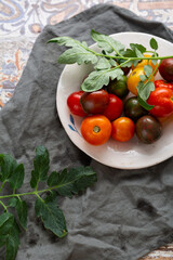 Top view of healthy local heirloom tomatoes on plate healthy food