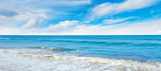 Bright beautiful ocean with small waves