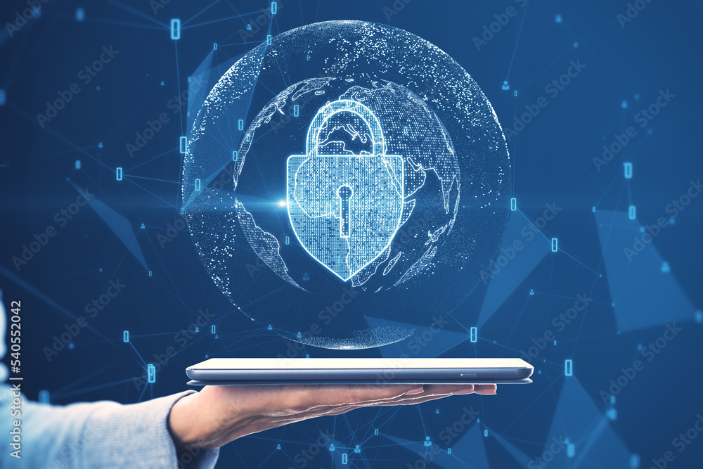 Poster close up of hand holding tablet with abstract glowing padlock and globe hologram on blurry blue back