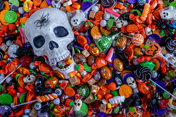 Fototapeta na wymiar Trick or Treat Halloween Candy background with props