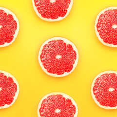 Top view seamless background of sliced fresh grapefruit.