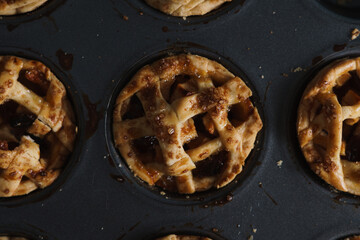 Mini Apple Pie Tarts in dark style food image