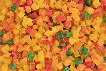 background of candied fruit pieces close up