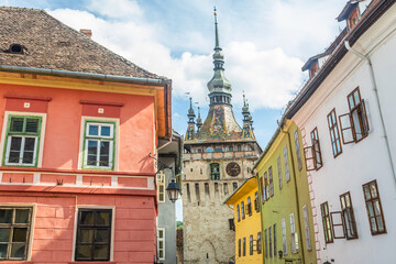 Sighisoara Clock Tower and colorful old houses, Transylvania, Romania