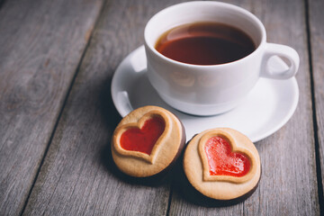 cookies in the shape of a heart with tea