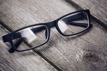 glasses on a wooden background