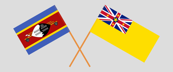 Crossed flags of Eswatini and Niue. Official colors. Correct proportion