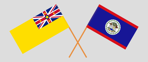 Crossed flags of Niue and Belize. Official colors. Correct proportion