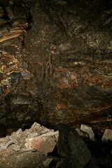 Stone vaults inside a shungite cave in Karelia