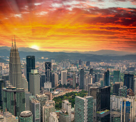 Aerial view of Kuala Lumpur city center skyline at dusk