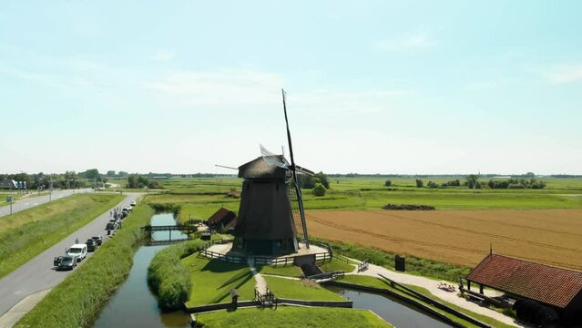 Aerial view of old windmill in rural aria in the Netherlands