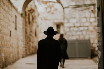 Naklejka premium Orthodox man walking streets of Jerusalem