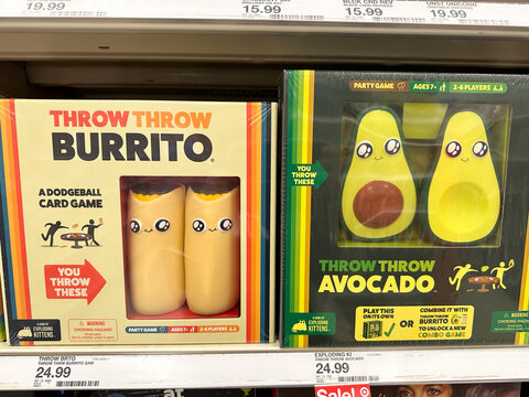 New Hope, Minnesota - October 7, 2022: Display of Throw Throw Burrito and Avocado card games, created by Exploding Kittens