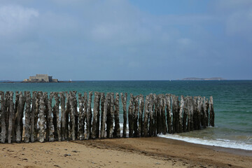Breakwater on Hoguette Beach in Saint Malo, Brittany, France