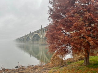 This bridge which spans the Susquehanna River fades away into the footy morning