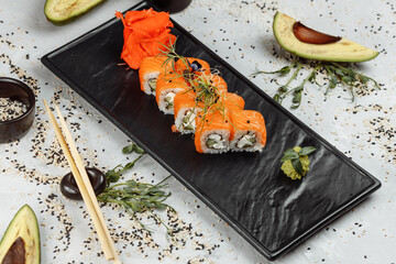 Sushi Philadelphia on a stone decorative plate