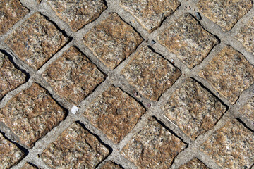 Close up textured background of a pavement