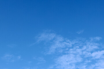blue fall sky with high wispy clouds