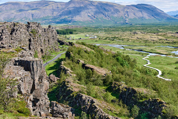 Rock walls of Almannagja Fault in Thingvellir National Park, Iceland on a beautiful clear summer day.