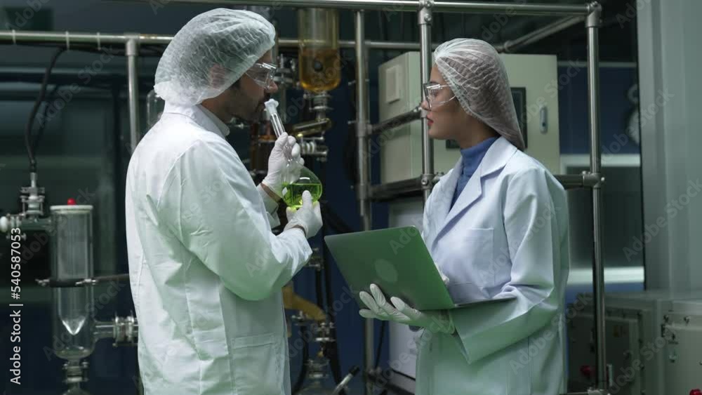 Poster two scientist in professional uniform working in curative laboratory for chemical and biomedical exp