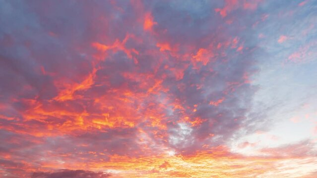 dramatic sunset sky with clouds - time lapse
