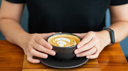 hot latte art coffee on table, relax time