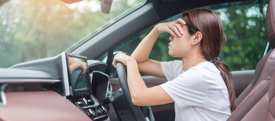 Fototapeta na wymiar woman feeling stress and angry during drive car long time. Asian girl tired and fatigue having headache stop after driving car in traffic jam. Sleepy, stretching and drunk concept