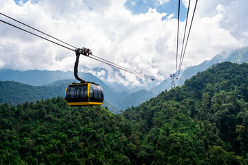 The world's longest electric cable car to Fan Si Pan mountain peak the highest mountain of Indochina with mist over the mountains