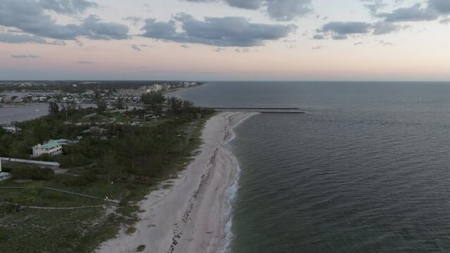 Flying over Casey Key Beach south to Venice at sunset
