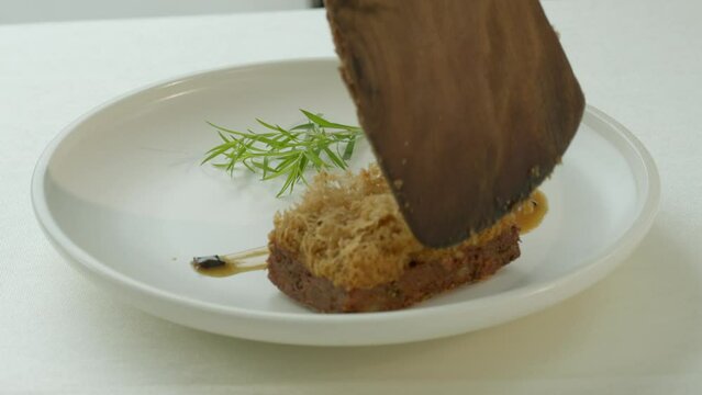 Serving special meal of Tokyo maru on a white plate in restaurant