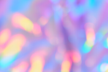 Soft gradient background with Smooth Blurred holographic iridescent colors with golden bokeh....