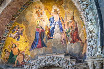 Fototapeta na wymiar St Mark Basilica catholic afresco, facade detail, Venice, Italy