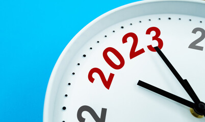 New year number 2023 on white clock