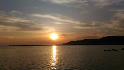 Obraz premium sunset over the river