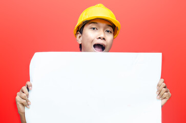 happy confident asian construction worker holding building design paper
