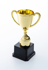 Golden trophy on white background