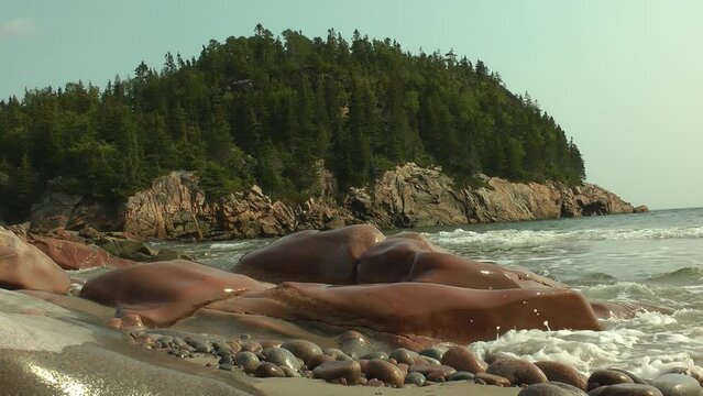 Rocky empty beach in Nova Scotia Canada
Rocks, stones, waves and cliffs on the beach at Ingonish Beach in Nova Scotia Canada
