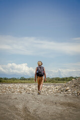 Person walking in the sand