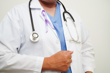 Asian woman doctor with purple ribbon, World Pancreatic Cancer day or World Alzheimer day.
