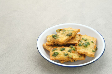 Tempe Mendoan, traditional fried tempeh, one of popular food from Indonesia.

