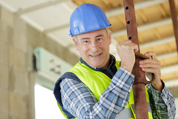 construction worker with arms crossed
