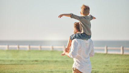 Father, child and shoulders for walk in nature spending quality time or bonding together in the...