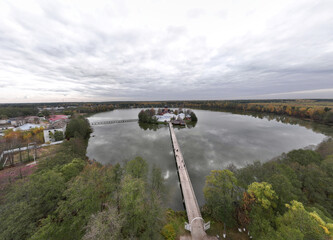 panoramic view from a drone of the ancient monastery on the island against the backdrop of autumn colors